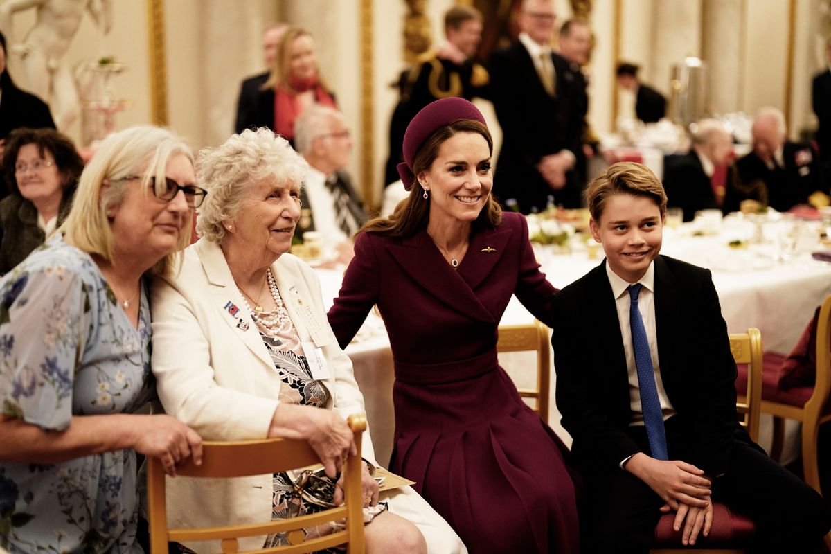 LONDON, ENGLAND - MAY 5: Catherine, Princess of Wales and Prince George join Second World War veterans at a tea party in Buckingham Palace following the military procession to mark the 80th anniversary of VE Day on May 5, 2025 in London, England. The King and Queen, joined by Members of the Royal Family, will take part in events from May 5th to May 8th to commemorate the 80th Anniversary of VE Day, which signalled the end of the Second World War in Europe. (Photo by Jordan Pettitt - WPA Pool/Getty Images)