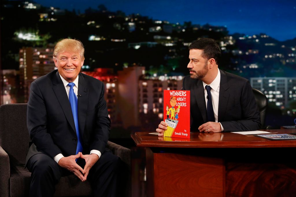 Kimmel and Trump talk on his TV show with the president smiling 
