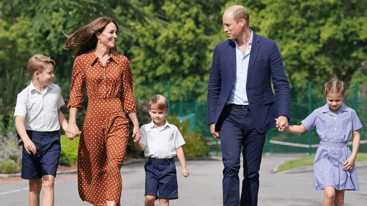 Prince George Marks His Final First Day of School at Lambrook Ahead of Major Change Prince George, Kate Middleton, Prince Louis and Princess Charlotte holding hands in a line with their parents walking to school