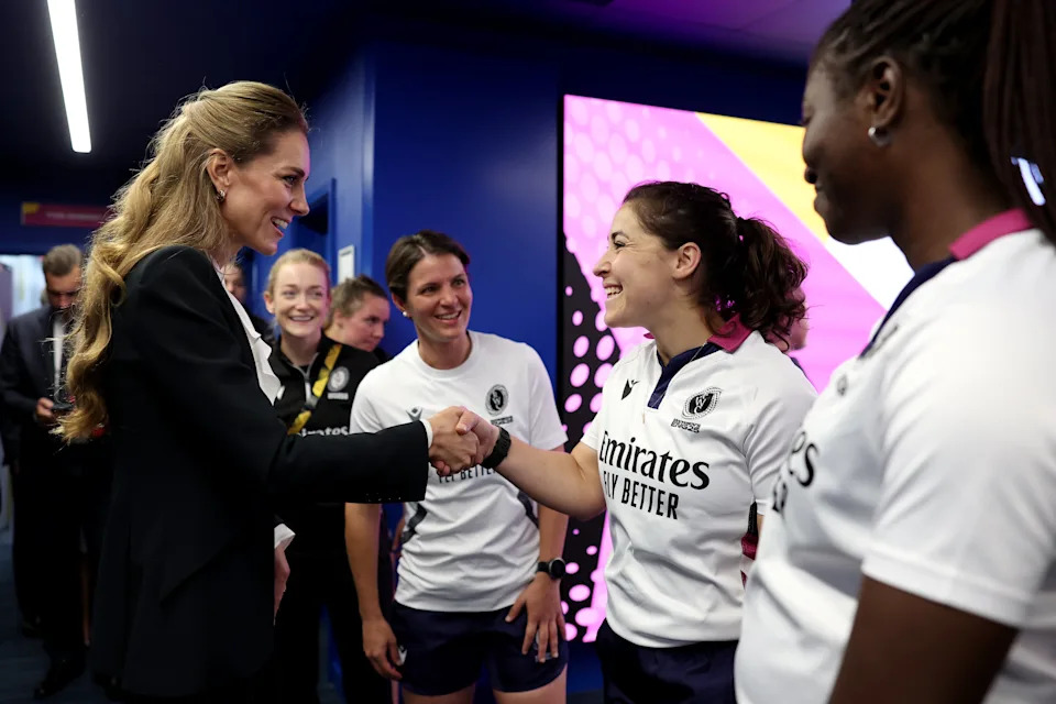 Catherine, hair tied back, shakes hands with Referee Amelia Luciano following the Women's Rugby World Cup 2025 Pool A match between England and Australia in Brighton, Sept. 6, 2025. / Alex Davidson - World Rugby / World Rugby via Getty Images