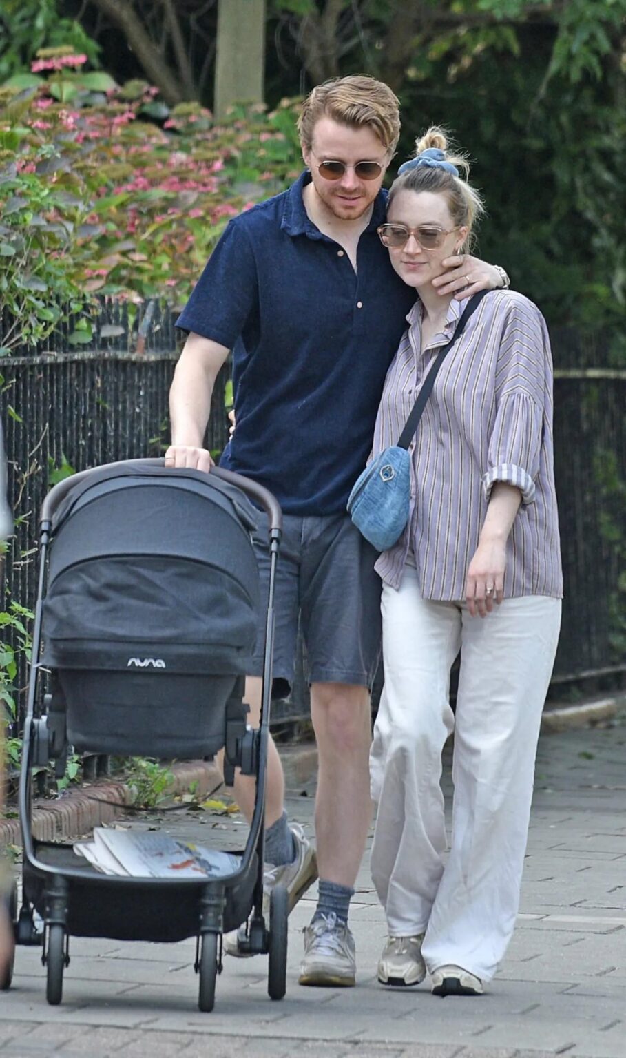 Saoirse Ronan and hubby Jack Lowden welcome first baby into world as loved-up pair spotted with pram in public