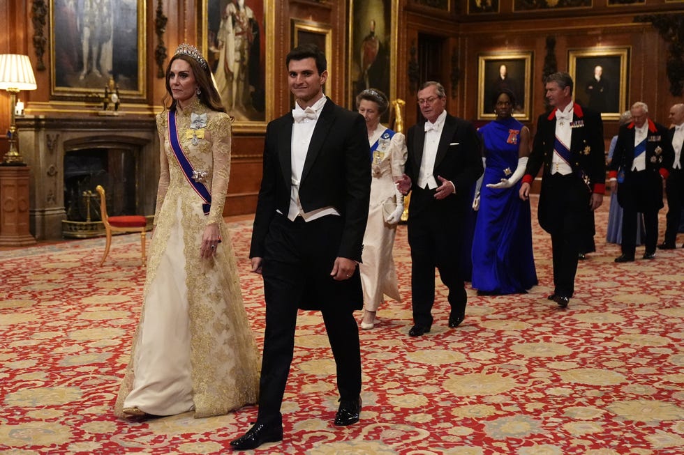 windsor, england september 17: catherine, princess of wales walks with michael boulos, followed by the princess anne, princess royal and us ambassador to the uk, warren stephen, at the state banquet at windsor castle, berkshire, on day one of us president donald trump's second state visit to the uk with his wife, first lady melania trump on september 17, 2025 in windsor, england. president trump is in england from sept. 16 18 on his second uk state visit, with the previous one taking place in 2019 during his first presidential term. (photo by aaron chown wpa pool/getty images)