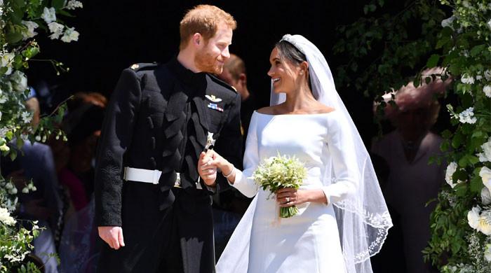 Prince Harry reacts as Meghan Markle shares 'private moments'