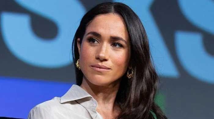 Meghan Markle poses with dogs amid talks of Harry's peace with King Charles