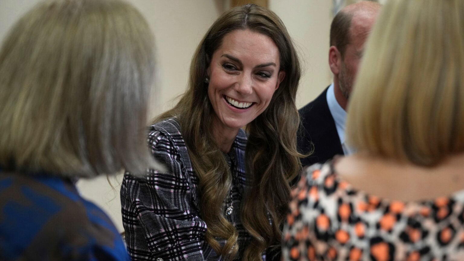Catherine, Princess of Wales listens as she visits the National Federation of Women's Institute (WI)
