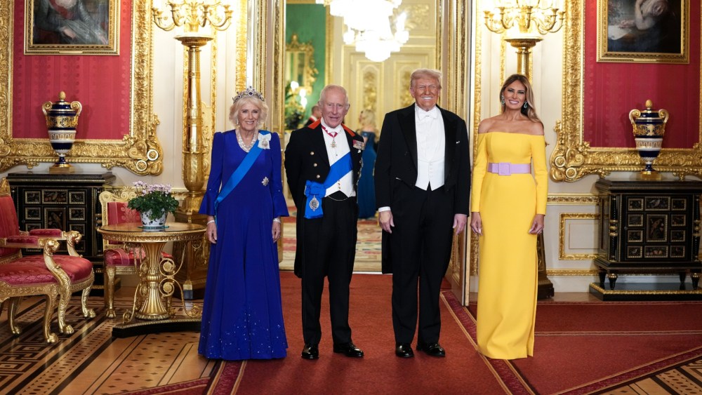 Queen Camilla wears a Fiona Clare gown with Queen Elizabeth II's sapphire and diamond tiara for the State Banquet hosted by King Charles III and members of the Royal Family at Windsor Castle during the state visit by the President of the United States of America on Sept. 17, 2025 in Windsor, England.