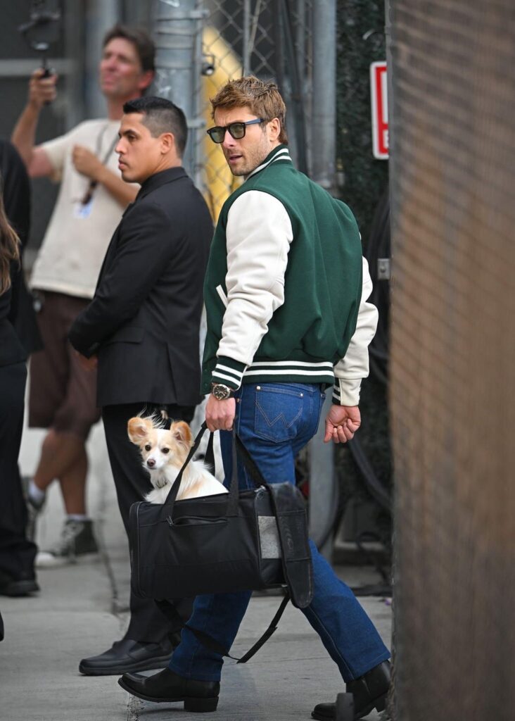 Glen Powell & Brisket arriving to ‘Jimmy Kimmel Live!’ yesterday in Los Angeles. (September 23, 2025)