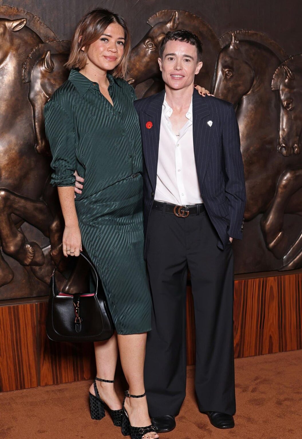 Elliot Page & Julia Shiplett attend the Gucci Spring/Summer 2026 show during Milan Fashion Week. (September 23, 2025)