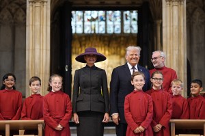 WINDSOR, ENGLAND - SEPTEMBER 17: US President Donald Trump and First Lady Melania Trump meet young members of the choir during a visit to St George's Chapel at Windsor Castle during the State visit by the President of the United States of America on September 17, 2025 in Windsor, England. (Photo by Aaron Chown - WPA Pool/Getty Images)