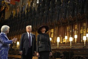 WINDSOR, ENGLAND - SEPTEMBER 17: Chapter Clerk, Charlotte Manley speaks to US President Donald Trump and First Lady Melania Trump during their visit to St George's Chapel at Windsor Castle during the State visit by the President of the United States of America on September 17, 2025 in Windsor, England. (Photo by Aaron Chown - WPA Pool/Getty Images)