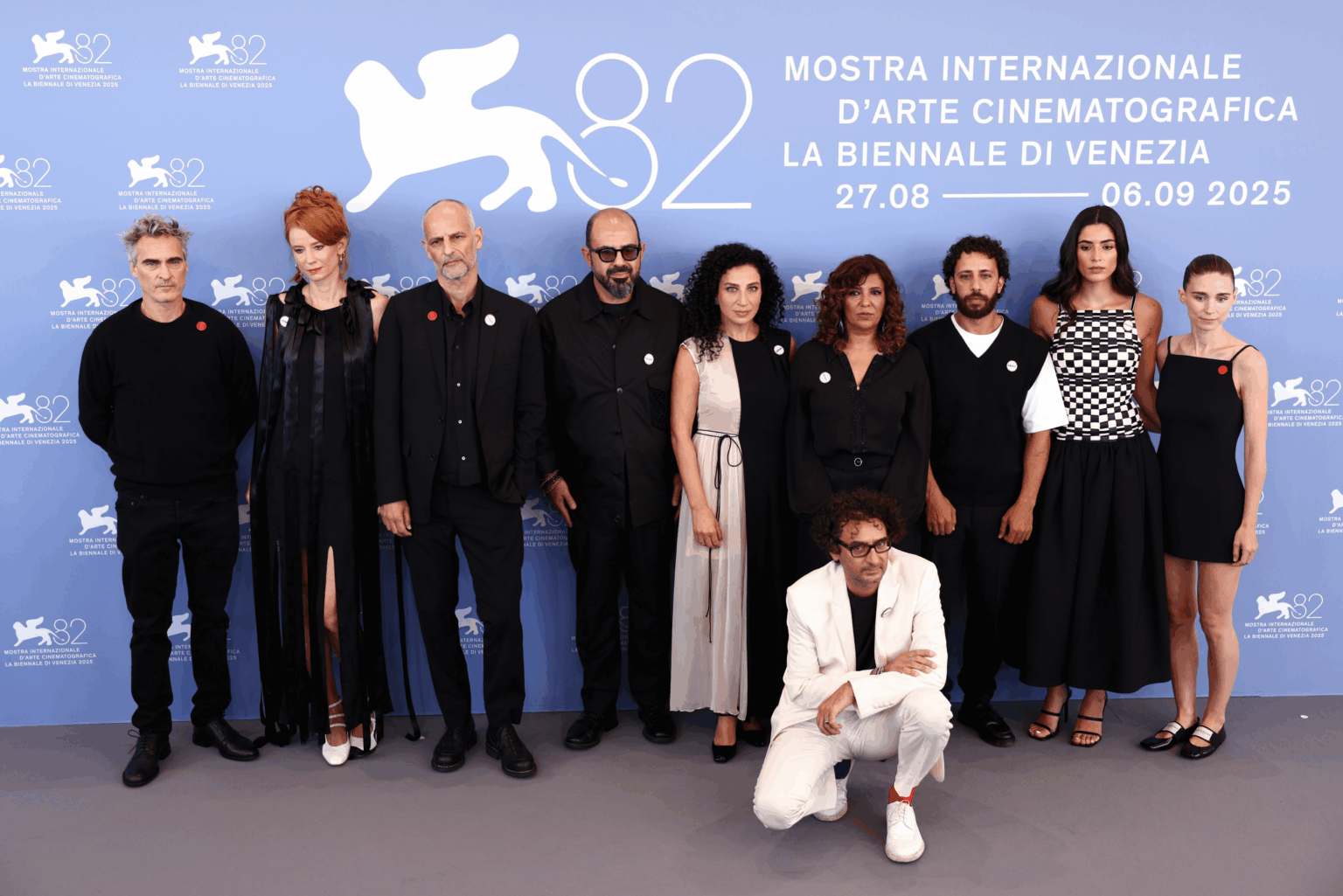 Joaquin Phoenix and Rooney Mara with the "The Voice of Hind Rajab" team at The Venice film festival.