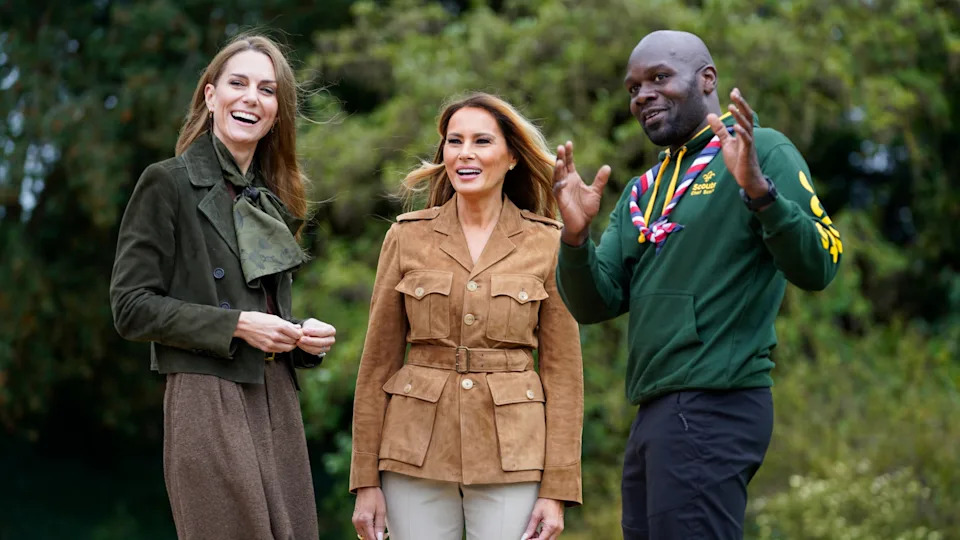U.S. First Lady Melania Trump (C) and Catherine, Princess of Wales (L) are welcomed by Chief Scout for the Scout Association Dwayne Fields as they tour Frogmore Cottage 
