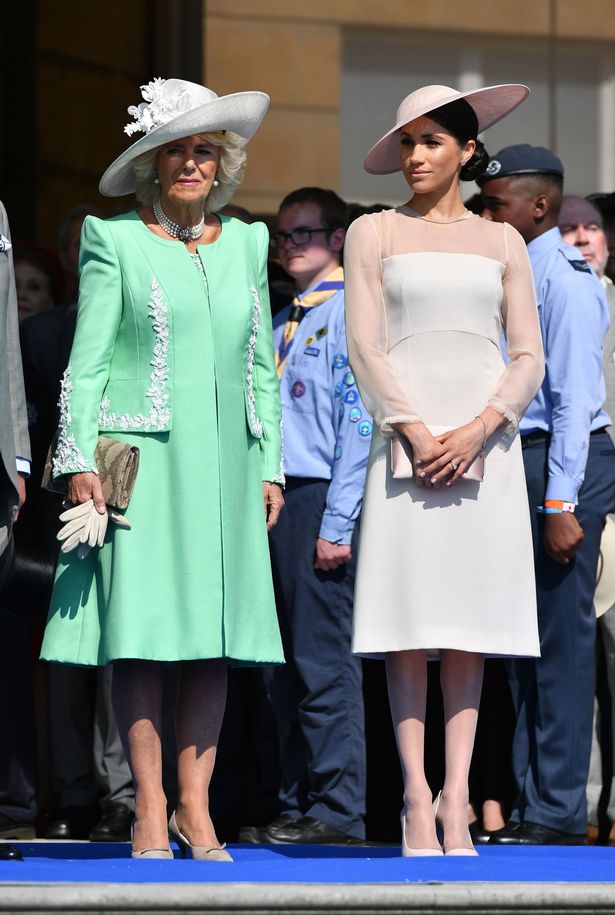 Meghan Markle next to Queen Camilla