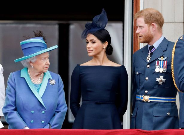 Harry and Meghan Markle with the late Queen on the Buckingham Palace balcony