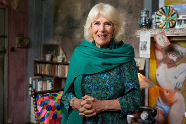 CHARLESTON, UNITED KINGDOM - MAY 16: Britain's Queen Camilla views the studio at Charleston House after making a surprise appearance at the opening session of the Charleston Festival in Charleston in Firle on May 16, 2024 in Charleston, England. The Queen joins this year's opening event called the 'Power of Reading', aiming to celebrate the power of books and reading for children and young people. (Photo by Kirsty Wigglesworth - WPA Pool/Getty Images)