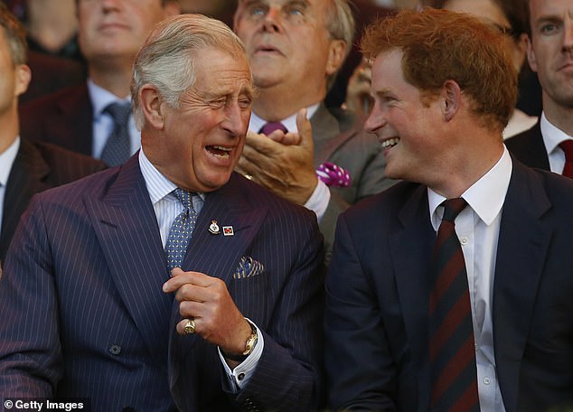Charles, then the Prince of Wales and Prince Harry at the opening of the Invictus Games in 2014
