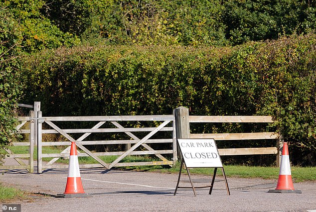 Another shot shows the enforcement of the car park closure - a move that has proved a particular sore point for local residents
