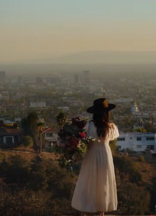In an advertisement video for Abigail's floral business, titled 'Flowers In My Teeth', uploaded in 2022, the American actress is seen adorning a long white dress with puff sleeves.
