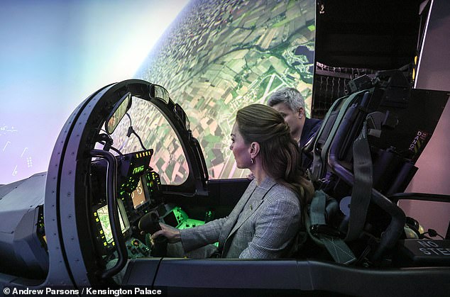 She took control of a flight simulator and met with personnel throughout her visit