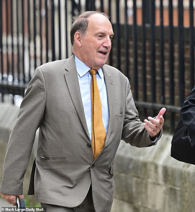Sir Simon Hughes arriving at the High Court which heard accusations he was involved in a 'camouflage scheme' to mislead the court over his case against the Daily Mail