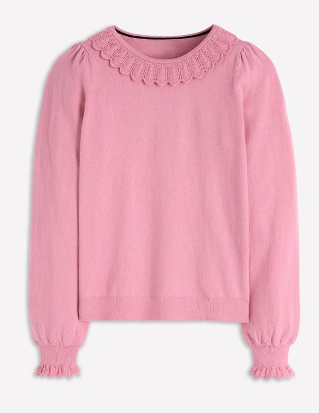 Boden's Melina Ruffle Jumper is made from a soft wool blend, with a semi-fitted silhouette featuring delicate scallop detailing at the neck and cuffs for a feminine finish