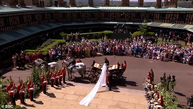 Then, while the Kingdom Choir harmoniously sang 'this little light of mine', the Duke and Duchess boarded their horse-drawn open-top Ascot Landau carriage to begin their celebratory ride through Windsor. However, Harry had become slightly distracted by his outfit choice