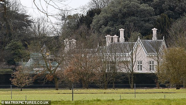 The couple had initially planned to quit Adelaide Cottage (pictured) on the royal Windsor estate and be in neighbouring Forest Lodge by Christmas