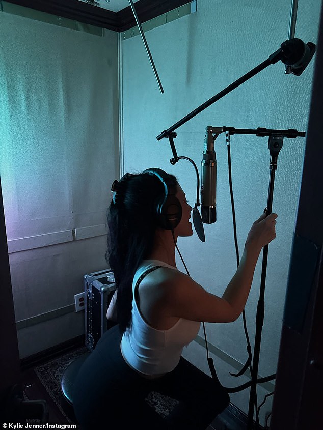 'One strike, two strike, let me get the mood right,' Jenner sang. 'I just wanna tell you, "I'm sorry" / Touch me, baby, tell me I'm your baby / Write your name all over my body / Cross the line, I might do it again (Oh) / Do it on purpose just to see how it ends'