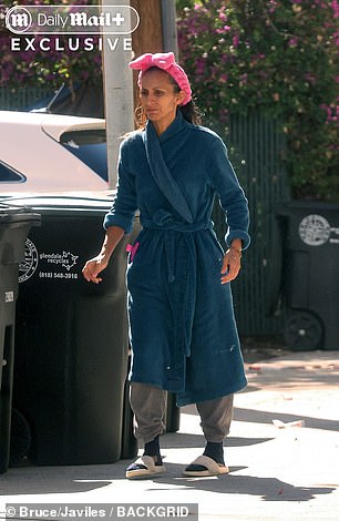 Now a dance teacher, Espinosa was a far cry from her glamorous former self and was seen putting the trash out in her bathrobe
