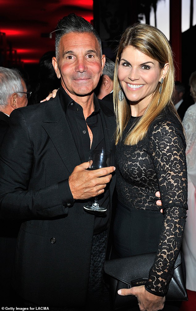 Lori Loughlin ended things with her husband of 27 years after discovering a trove of 'incriminating' text messages and emails, a source told Page Six; Loughlin is pictured with husband Mossimo Giannulli in 2015 in LA