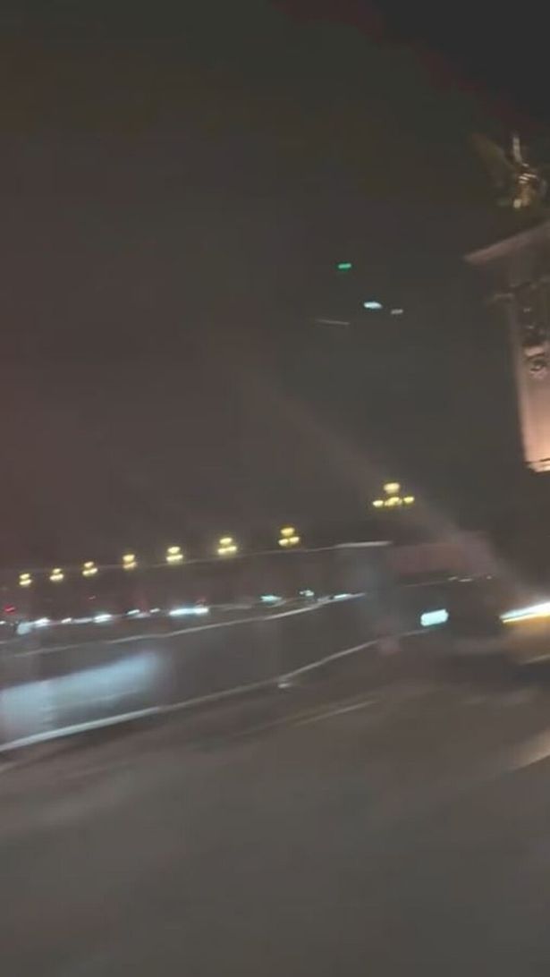 A grab from a video of Meghan Markle in a car driving around Paris
