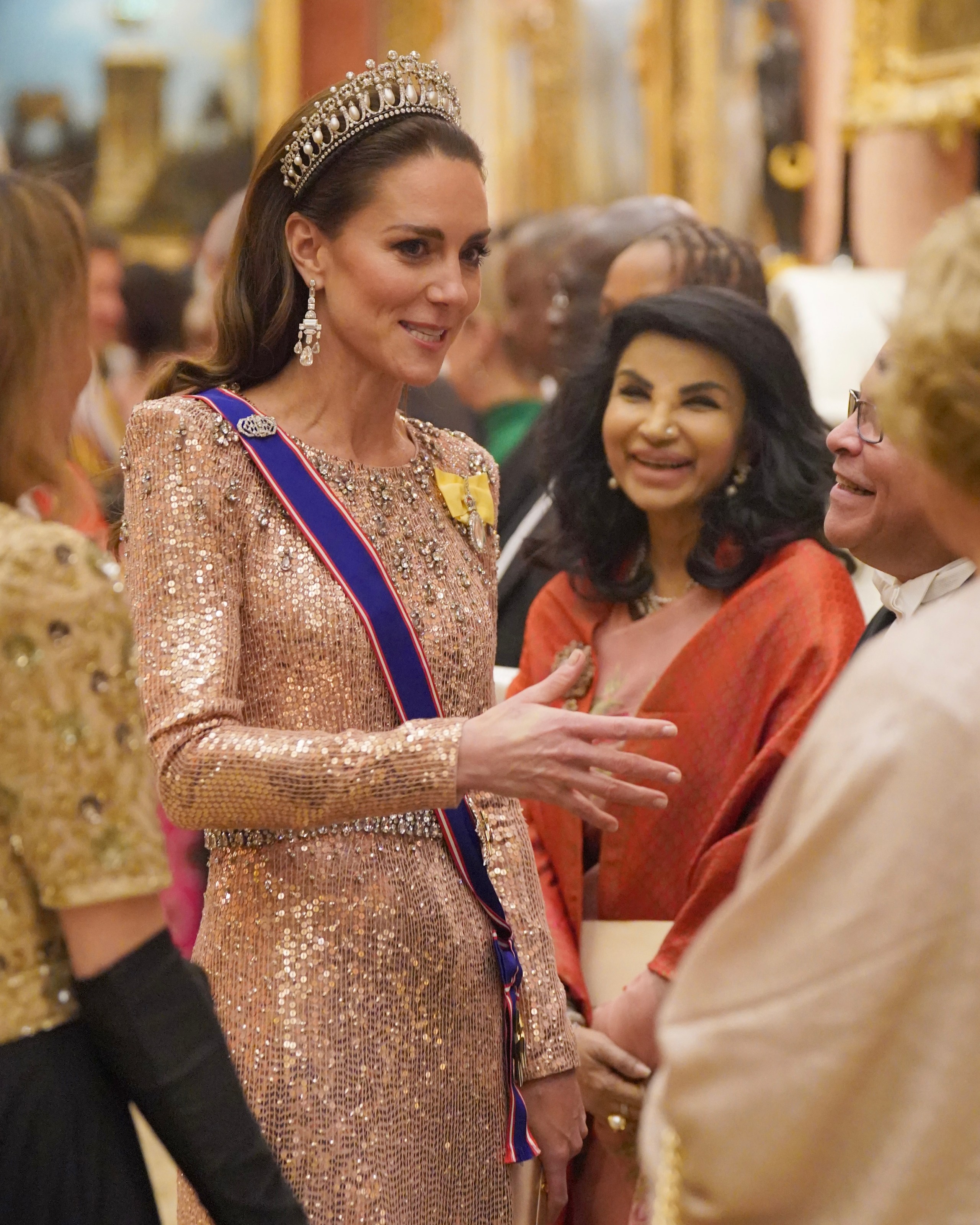 Kate Middleton wears the Lover's Knot Tiara during an evening reception for the Diplomatic Corps at Buckingham Palace