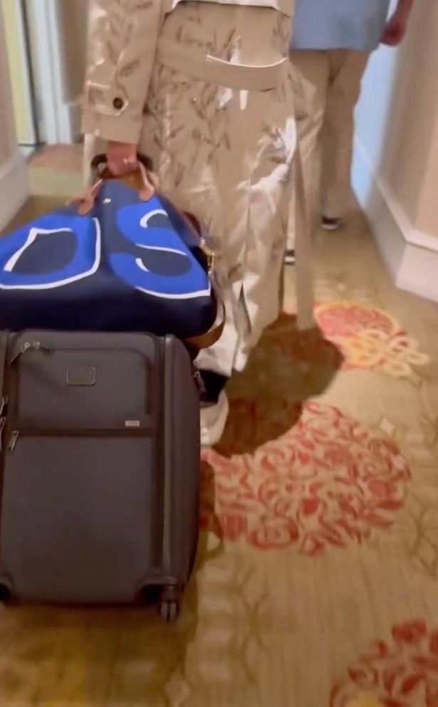 A bag had the initials DS emblazoned on it