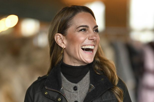 COOKSTOWN, NORTHERN IRELAND - OCTOBER 14: Catherine, Princess of Wales laughs during her visit to Mallon Farm, a flax farm in County Tyrone that is spearheading the revival of flax growing for linen, as a blueprint for sustainable farming systems on October 14, 2025 in Cookstown, Northern Ireland. During their visit, the Prince and Princess of Wales are visiting organisations providing creative and entrepreneurial opportunities for young people in rural areas of Northern Ireland. (Photo by Samir Hussein - Pool/Getty Images)