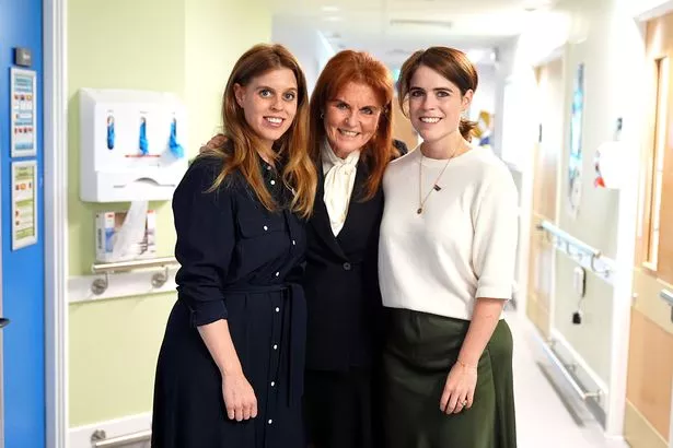 Beatrice and Eugenie with their father Prince Andrew