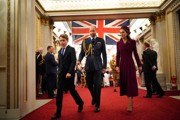 Prince George with Prince William and Kate Princess of Wales join Second World War veterans at a tea party in Buckingham Palace