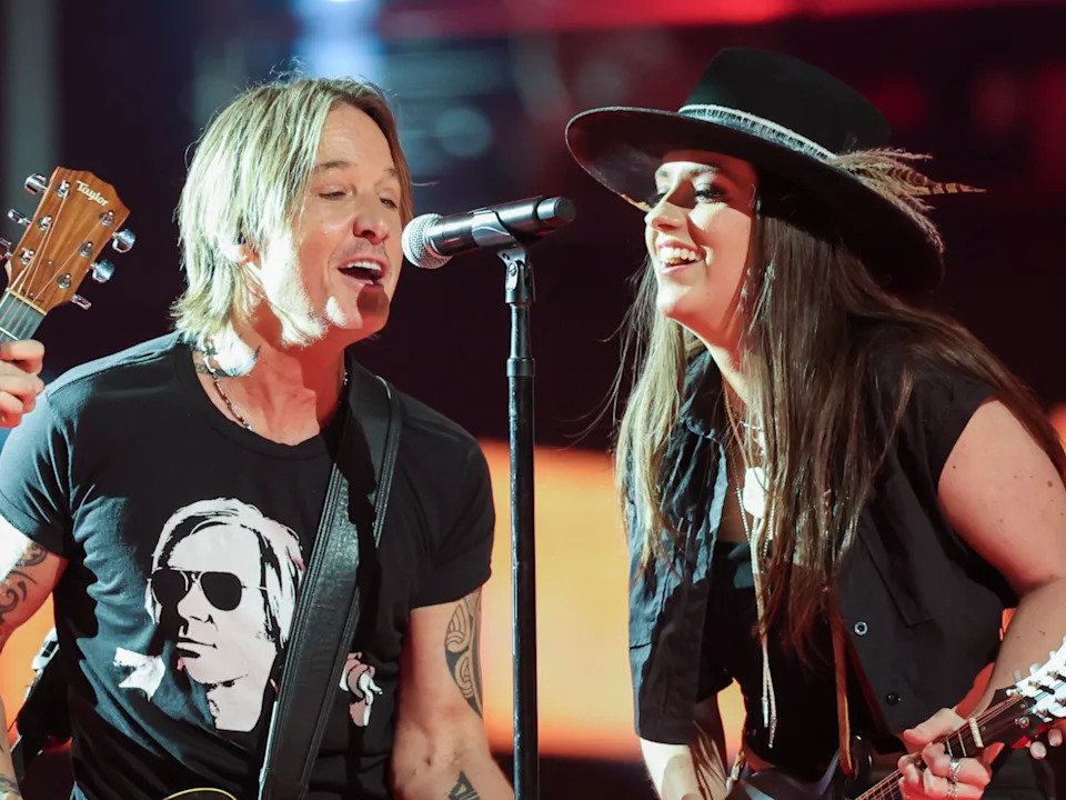 Anna Vaus, Keith Urban and Maggie Baugh perform onstage at the 2024 CMT Music Awards held at the Moody Center on April 7, 2024 in Austin, Texas.