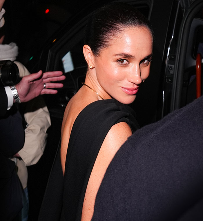 Meghan Markle leaving an event with a sleek hairstyle, highlighting backlash and Lana Del Rey's husband praised for classier response.