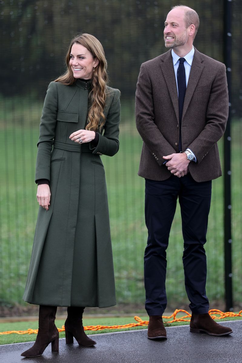 Kate Middleton joined Prince William on a visit to Northern Ireland, wearing one of her most meaningful coats, a long, military-style design by Alexander McQueen. 
