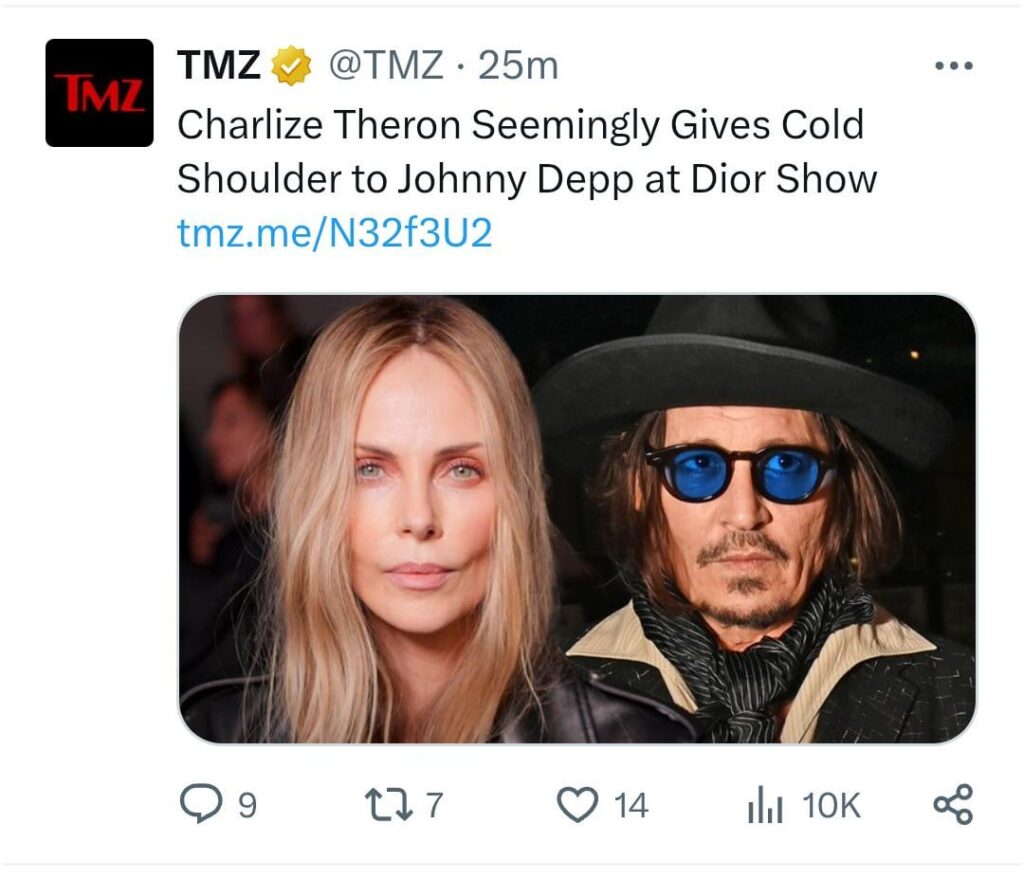 Charlize knows what's up: Seemingly gives cold shoulder to Johnny Depp at Door show