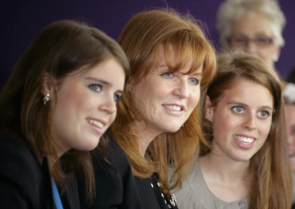Sarah Ferguson pictured with her daughters, Eugenie and Beatrice, in 2010 in Newcastle upon Tyne, England. / Max Mumby/Indigo / Getty Images
