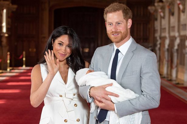Photo of the Duke and Duchess of Sussex showing off their newborn child Prince Archie in 2019