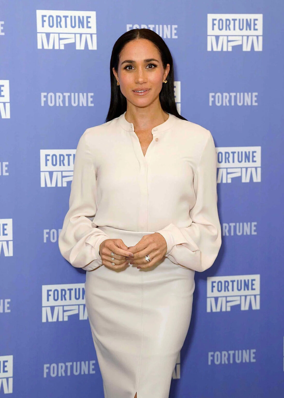 Meghan Markle Rewears a Classic White Dress in a Rule-Bending Look for Emotional Outing With Prince Harry
