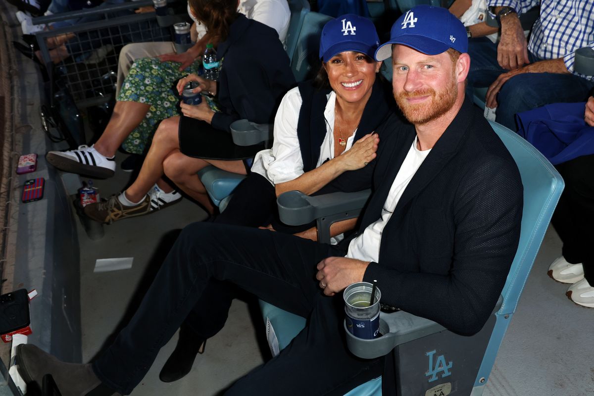 Prince Harry and Meghan Markle root for the Dodgers at the World Series