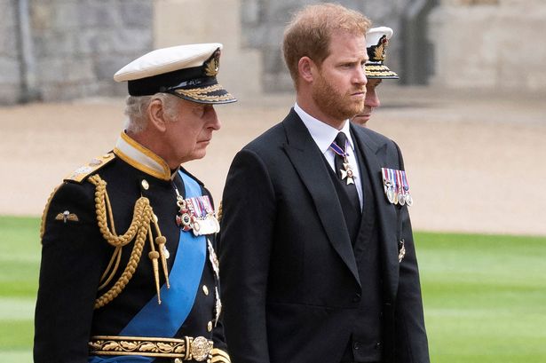 King Charles and Prince Harry pictured in 2022