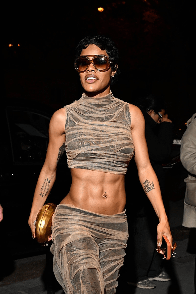 Teyana Taylor (and her marvelous abs) attending Kim Kardashian's birthday party in Paris.