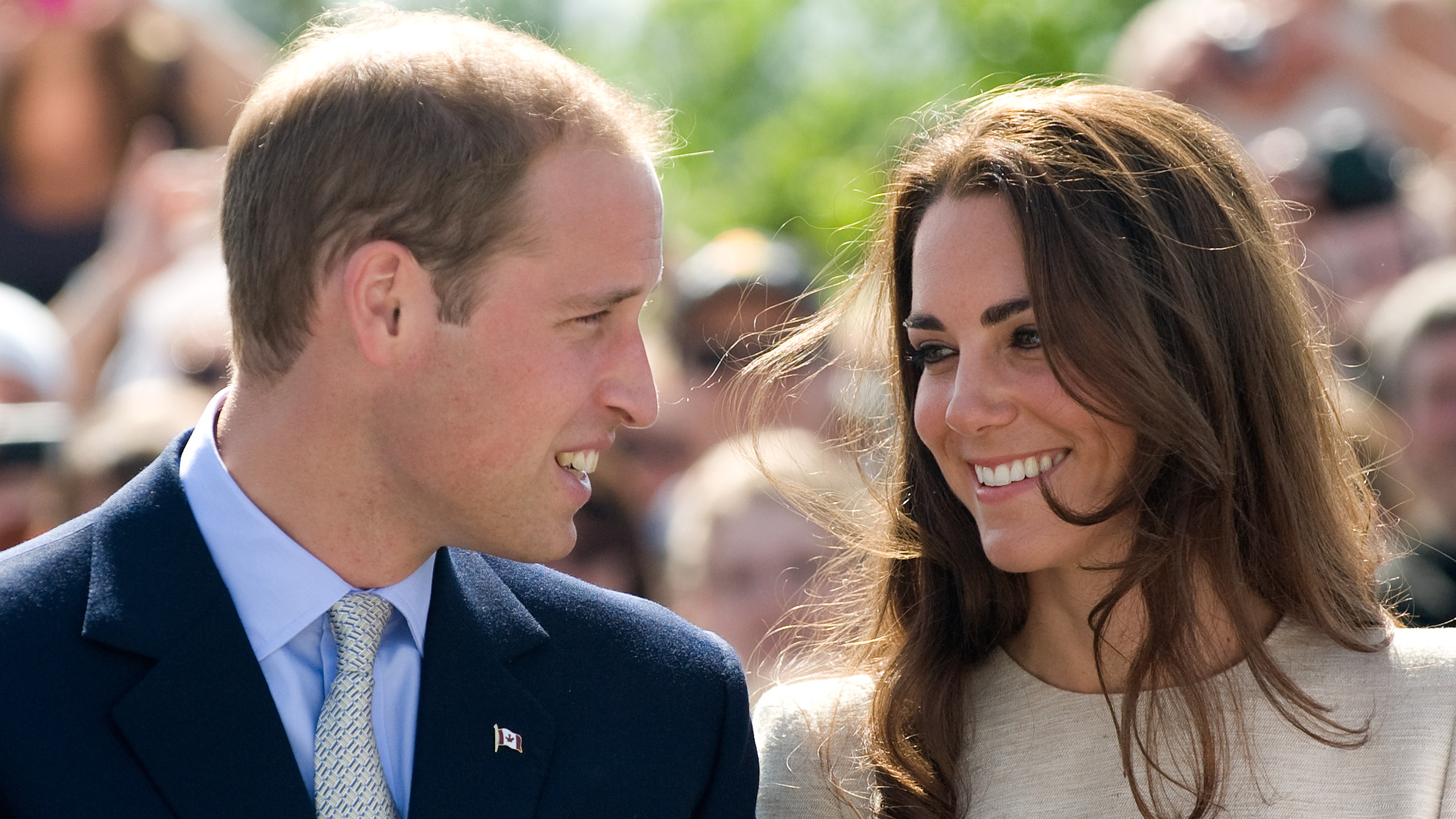 Catherine, Princess of Wales and Prince William look at each other during their visit to the Somba K'e Civic Plaza on day 6 of the Royal Couple's North American Tour, July 5 2011