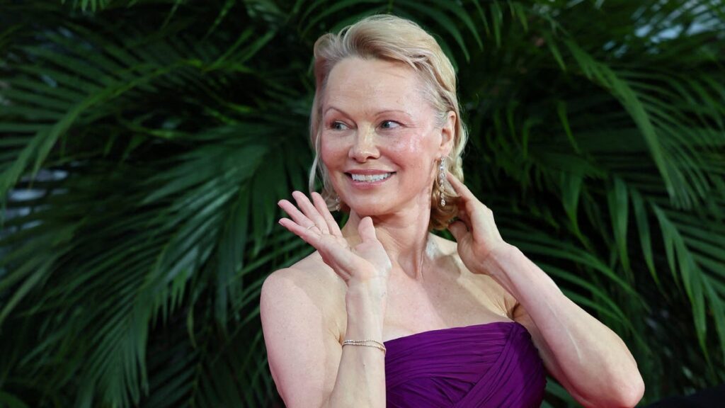 See Pamela Anderson's hair transformation from blonde to copper red