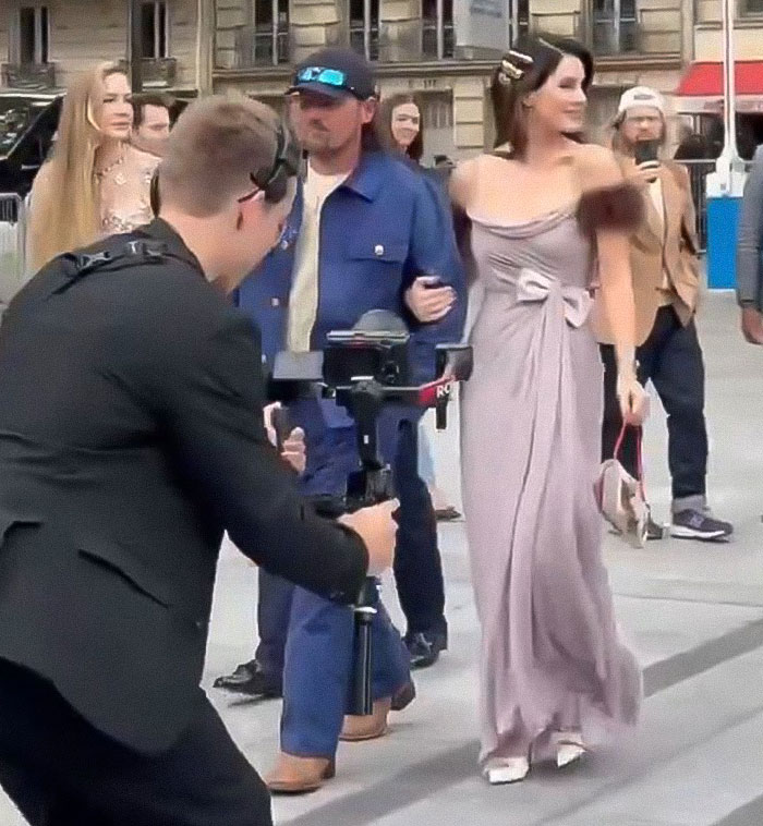 Lana Del Rey's husband praised for being classier, walking arm in arm with her during a public appearance.