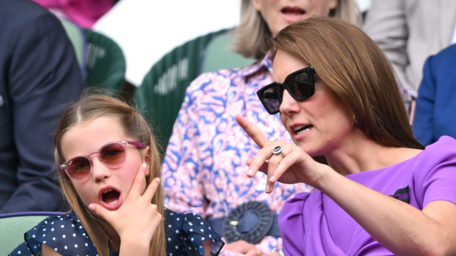 Kate Middleton on Princess Charlotte’s Latest Favorite Hobby Princess Charlotte looks shocked while wearing a navy and white polka dot dress at Wimbledon, as her mom Kate Middleton points